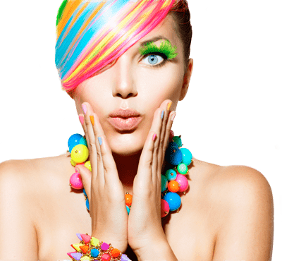 A woman has rainbow dyed hair and colorful jewelry