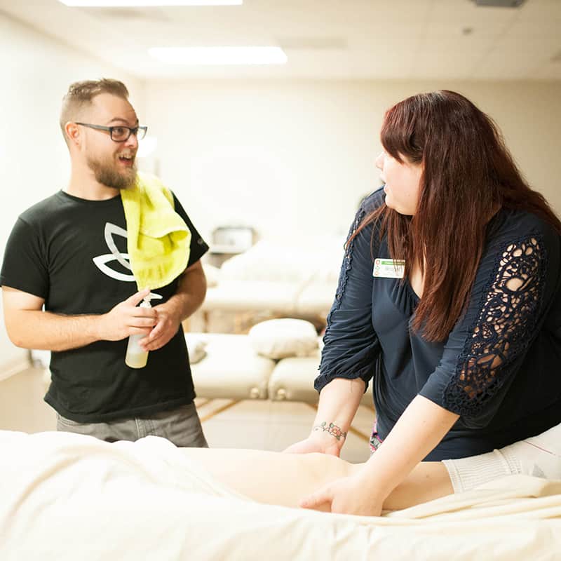 Two Clary Massage Therapy Students Learn Together