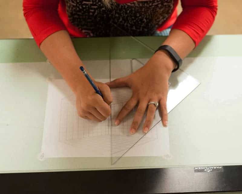 Clary Interior Design Student Using a Ruler