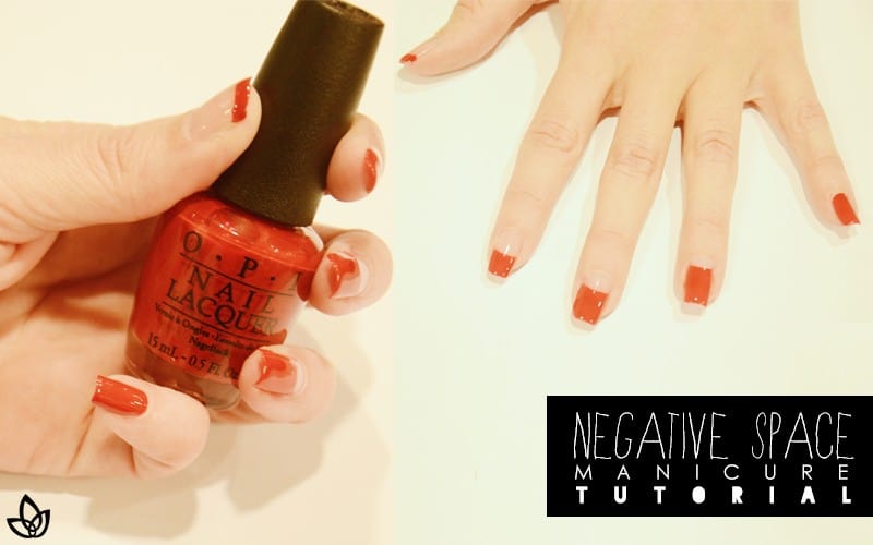 manicure with red/orange nail polish