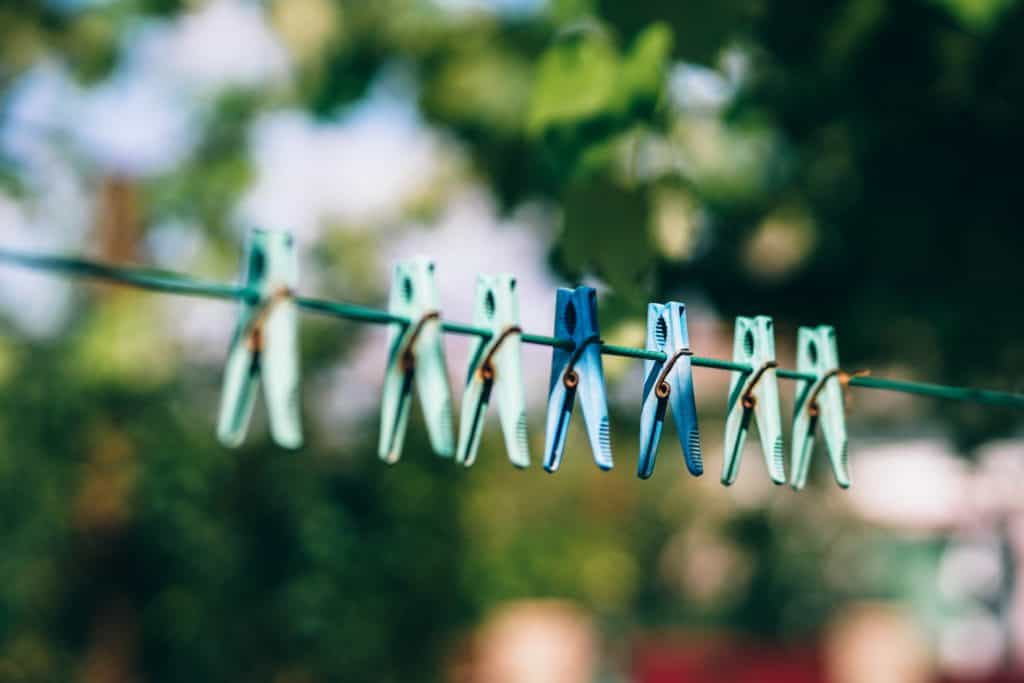 blue clothes pins on a string