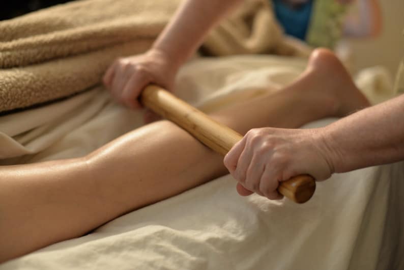 PIc of Bamboo Massage being performed